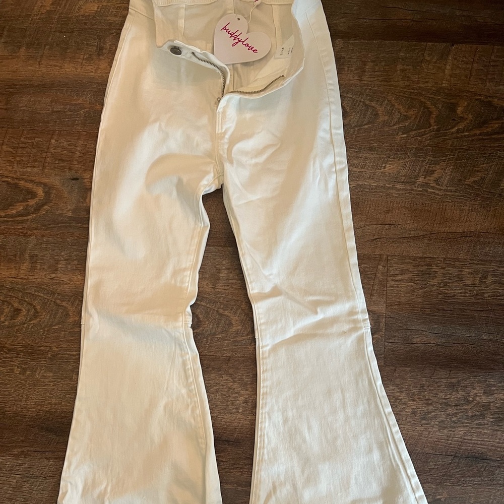NWT size 26 white buddy love flare denim pants. Never even tried on